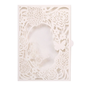 Detailed laser-cut white floral invitation card with butterfly patterns and elegant cutout