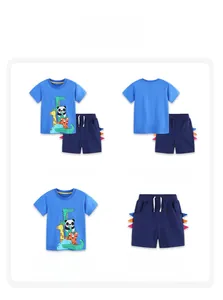 Detail view of boys blue t-shirt with animal print and drawstring navy shorts set