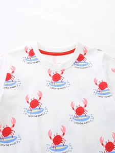 Kids cotton white T-shirt featuring cartoon crab prints and catch the waves slogan