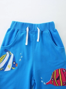 Blue knit shorts for boys with tropical fish embroidery and white drawstring waist