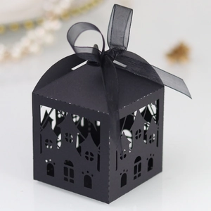 Detailed laser-cut spider web castle Halloween candy box with black satin ribbon bow