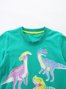 Kids green cotton T-shirt featuring colorful luminous dinosaur prints for boys