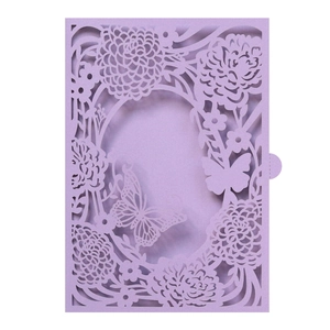 Lavender purple laser-cut wedding invitation cover with intricate floral and butterfly design