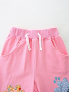 Pantaloni in maglia rosa per bambina con coulisse elastica e ricamo floreale