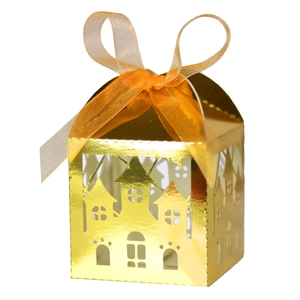 Laser-cut gold castle gift box with orange ribbon for Halloween and party favors