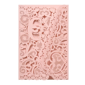 Elegant laser-cut pink wedding invitation card with lace edges and pumpkin carriage design