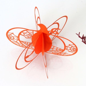 3D orange paper pumpkin lantern with spider web cutout for Halloween party decoration