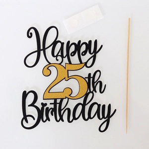 Detail of 25th birthday cake topper set with black glitter cardstock and gold accents