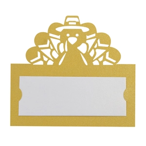 Detailed view of laser-cut turkey place card with white insert for Thanksgiving tables