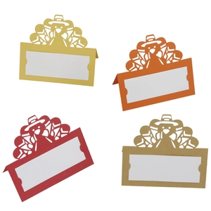 Laser-cut turkey place cards in four colors for Thanksgiving table setting guest names