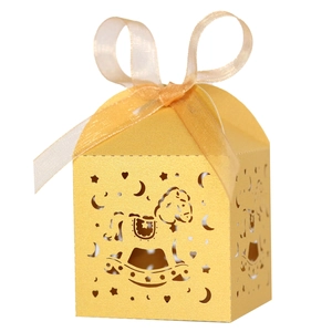 Golden hollow laser-cut rocking horse candy gift box with elegant ribbon bow