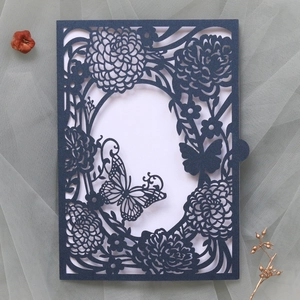 Navy blue laser cut wedding invitation card featuring butterfly and rose hollow patterns