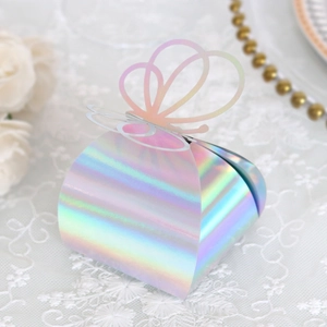 Macro detail of laser-cut butterfly gift box with iridescent holographic finish