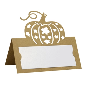 Detailed laser-cut pumpkin place card in brown kraft paper for Thanksgiving table decor