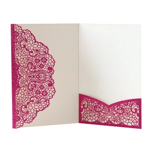Detail of rose red glitter wedding invitation with laser cut lace pocket and ivory insert