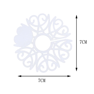 Detailed laser-cut white paper place card with 7cm diameter and butterfly pattern detail
