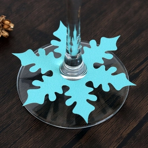 Blue snowflake wine glass place card for Christmas table decorations and holiday parties