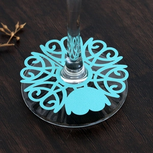 Laser cut lake blue wine glass place cards with geometric hollow pattern for wedding decor