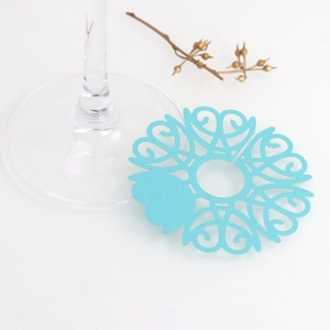 Laser-cut heart pattern blue paper wine glass place cards for wedding guest names