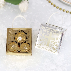 Detail of hollow cross candy box with pearl paper texture and gold finish