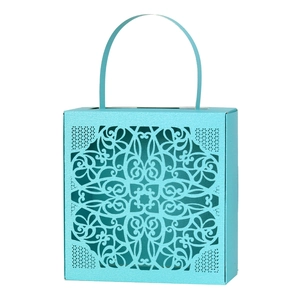 Elegant light blue laser-cut lace candy box with handle for wedding favors and chocolate