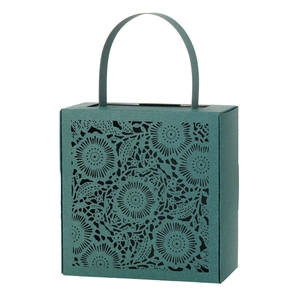 Dark green laser-cut wedding candy box with elegant floral hollow patterns and handle