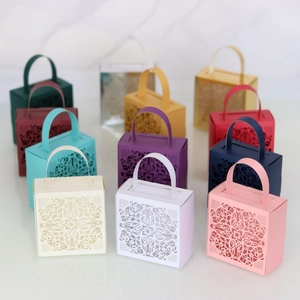Lace-cut hollow candy boxes in multiple colors for wedding gifts and party favors