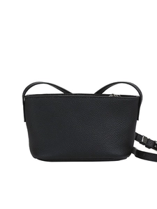Minimalist black lychee pattern leather bucket bag with slim shoulder strap on white backdrop