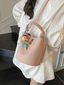 Pink lychee texture leather bucket bag with silver twist lock and cute pearl pendant