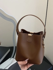 Retro brown bucket bag with gold metal clasp and smooth PU leather shoulder strap design