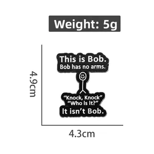 White geometric graffiti brooch with This is Bob stick figure humor design, 4.9cm size