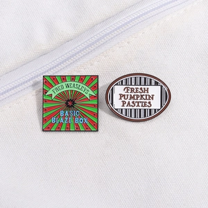 Set of two magic themed enamel pins featuring Wizard Wheezes and Pumpkin Pasties designs