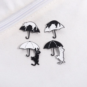 Funny cartoon black and white cat umbrella enamel pin set for bags and clothing