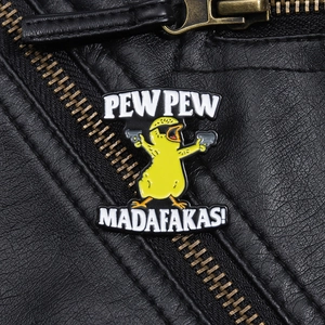 Badass yellow duck enamel pin with 'Pew Pew' text on black leather jacket background