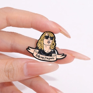 Minimalist enamel pin featuring a cartoon woman and help me I'm poor quote on hand