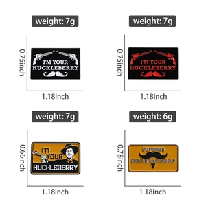Detailed views of four I'M YOUR HUCKLEBERRY enamel pins with western cowboy designs