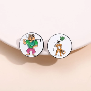 Funny enamel pins set featuring cartoon bulldog and tiger playing golf on round badges