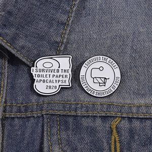 Set of two 2020 toilet paper apocalypse pins on denim jacket collar for casual styling