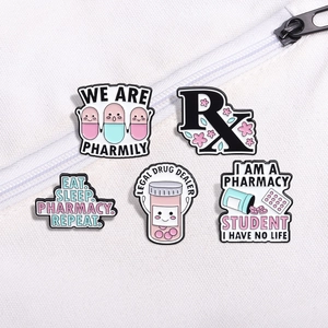 5-piece creative medical enamel pin set featuring pink pill bottles and Rx designs