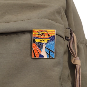 Artistic rectangular enamel brooch featuring The Scream painting on a canvas backpack