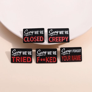 Five-piece set of black and red rectangular enamel pins with humorous slogan designs