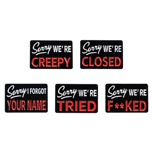 Set of five black enamel pins with funny slogans and rectangular creative metal design