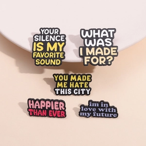 Set of 5 enamel pins featuring song lyric quotes like Your Silence Is My Favorite Sound