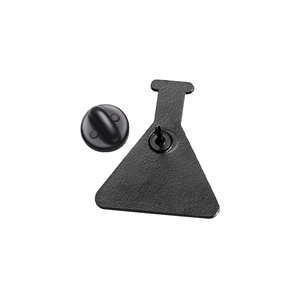 Close-up of the back components of a matte black science flask metal enamel pin