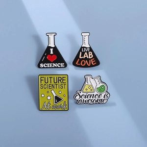 Science theme enamel pin set with laboratory beaker designs and motivational quotes
