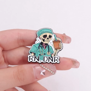 Funny skeleton nurse enamel pin with coffee cup and RN DNR text on pink background