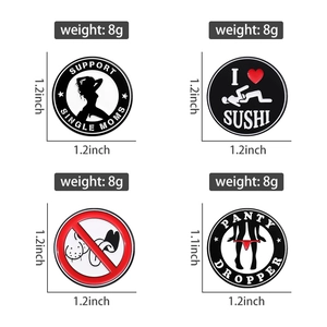Detail view showing four round enamel pins with unique graphic icons in a 2x2 grid layout