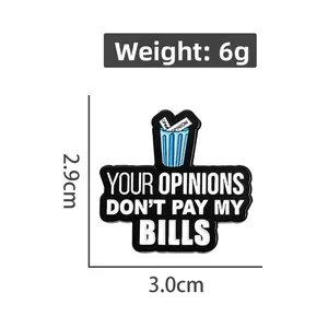 Detail of metal enamel badge with Your Opinions Don't Pay My Bills slogan and trash bin icon