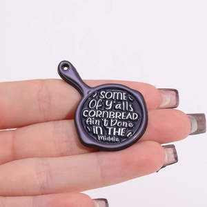 Funny cornbread quote enamel pin in creative skillet shape for backpacks and jackets