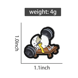 Detail of cartoon egg lifting barbell enamel pin with weight and size specifications